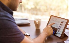 man holding tablet computer