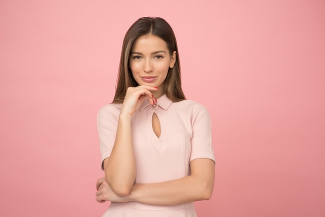 woman wearing pink collared half sleeved top 1036623