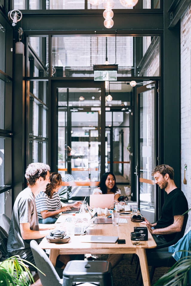 group of people in a meeting 3626622